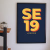 Lifestyle - Personalised Postcode Print hanging on a living room wall