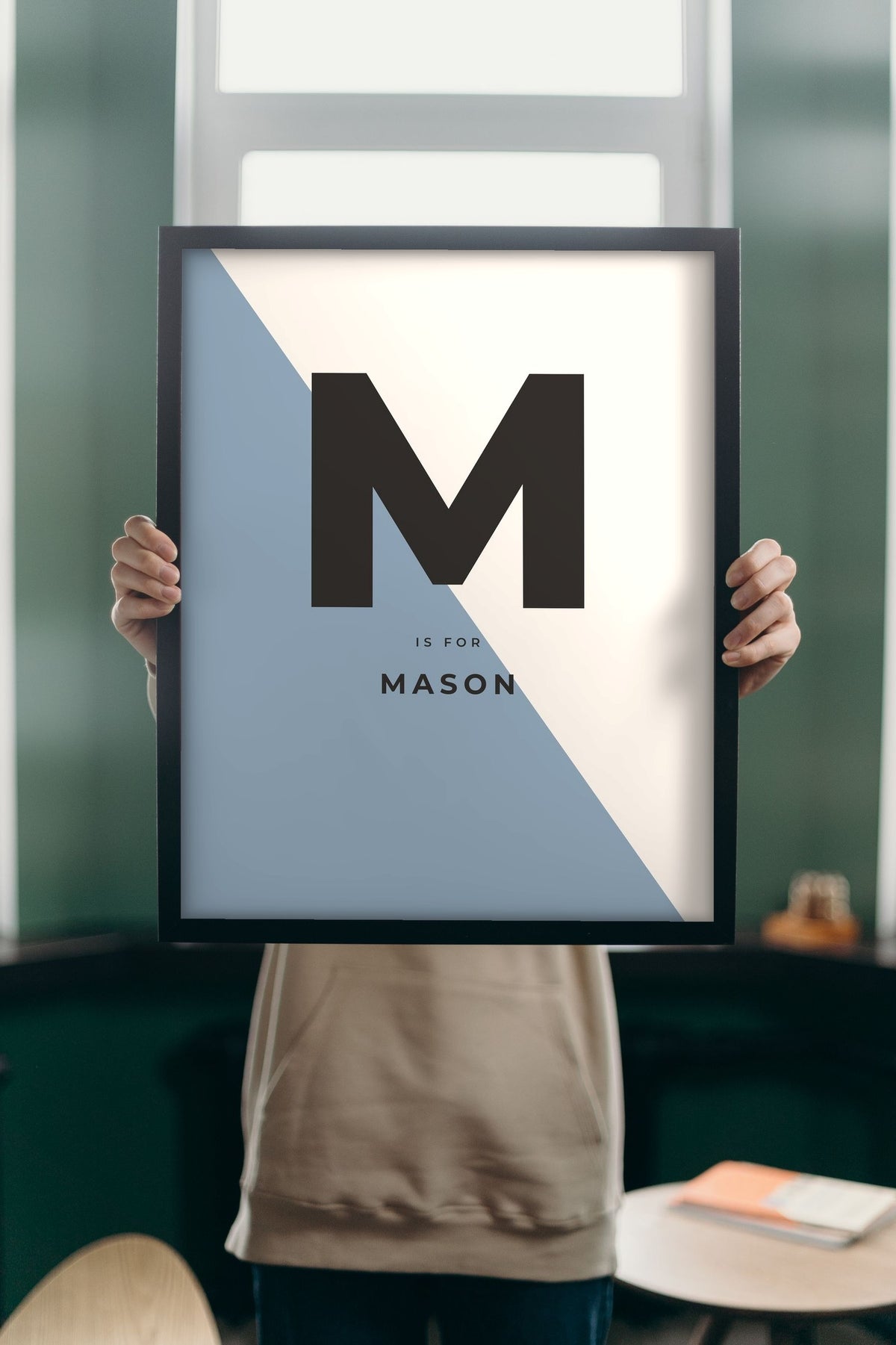 Lifestyle - Personalised Nursery Name Print held up in a bright room