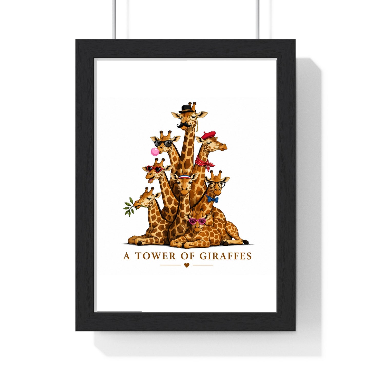 A Tower of Giraffes poster framed in black wood with perspex front