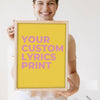 Lifestyle - Personalised Song Lyrics Print held by a smiling woman