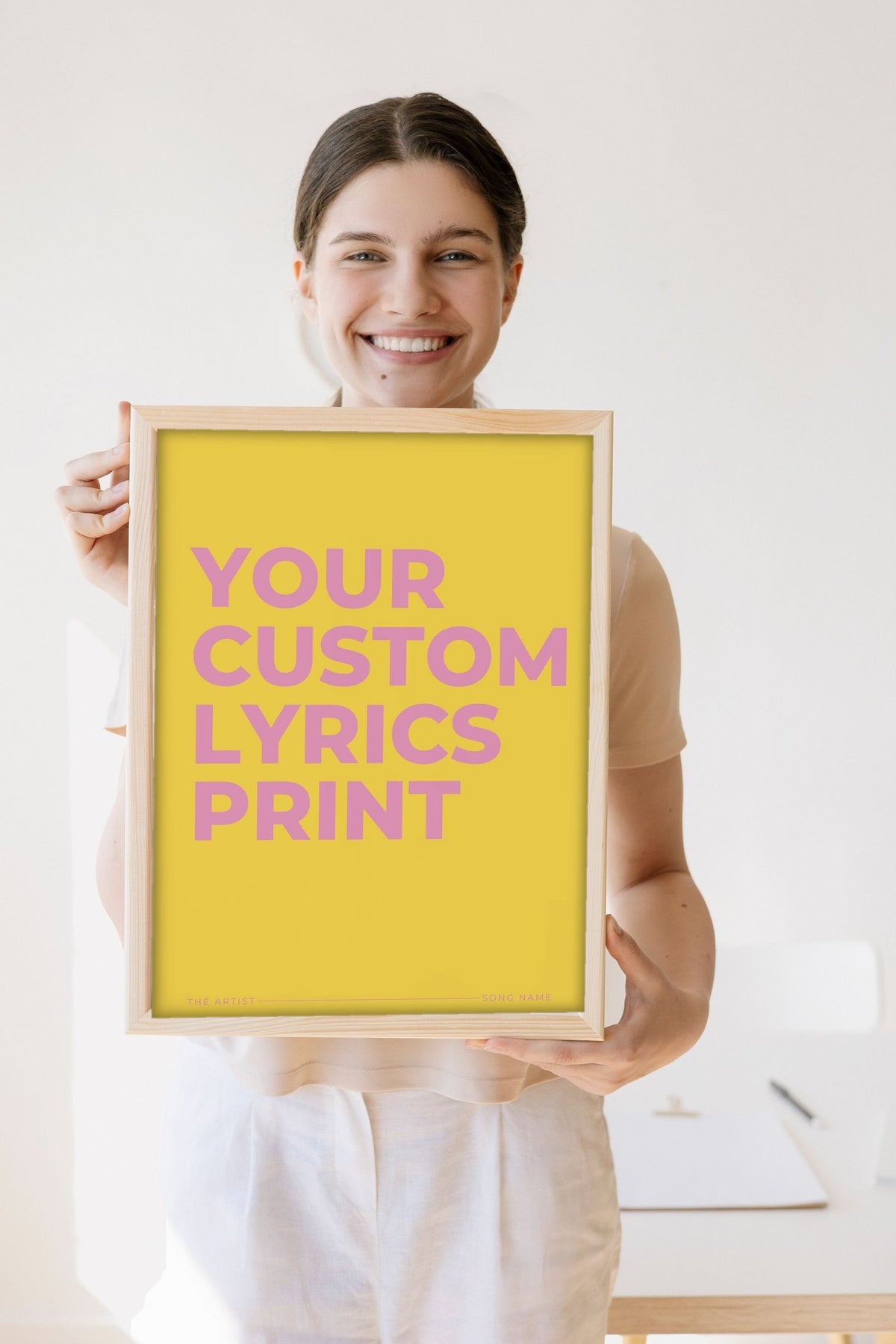 Lifestyle - Personalised Song Lyrics Print held by a smiling woman