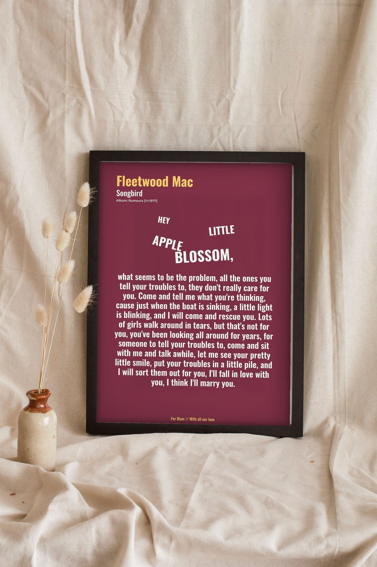 Lifestyle - Personalised Song Lyrics Print leaning in a frame with dried flowers