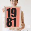 Lifestyle - Personalised Date Print held by a smiling woman
