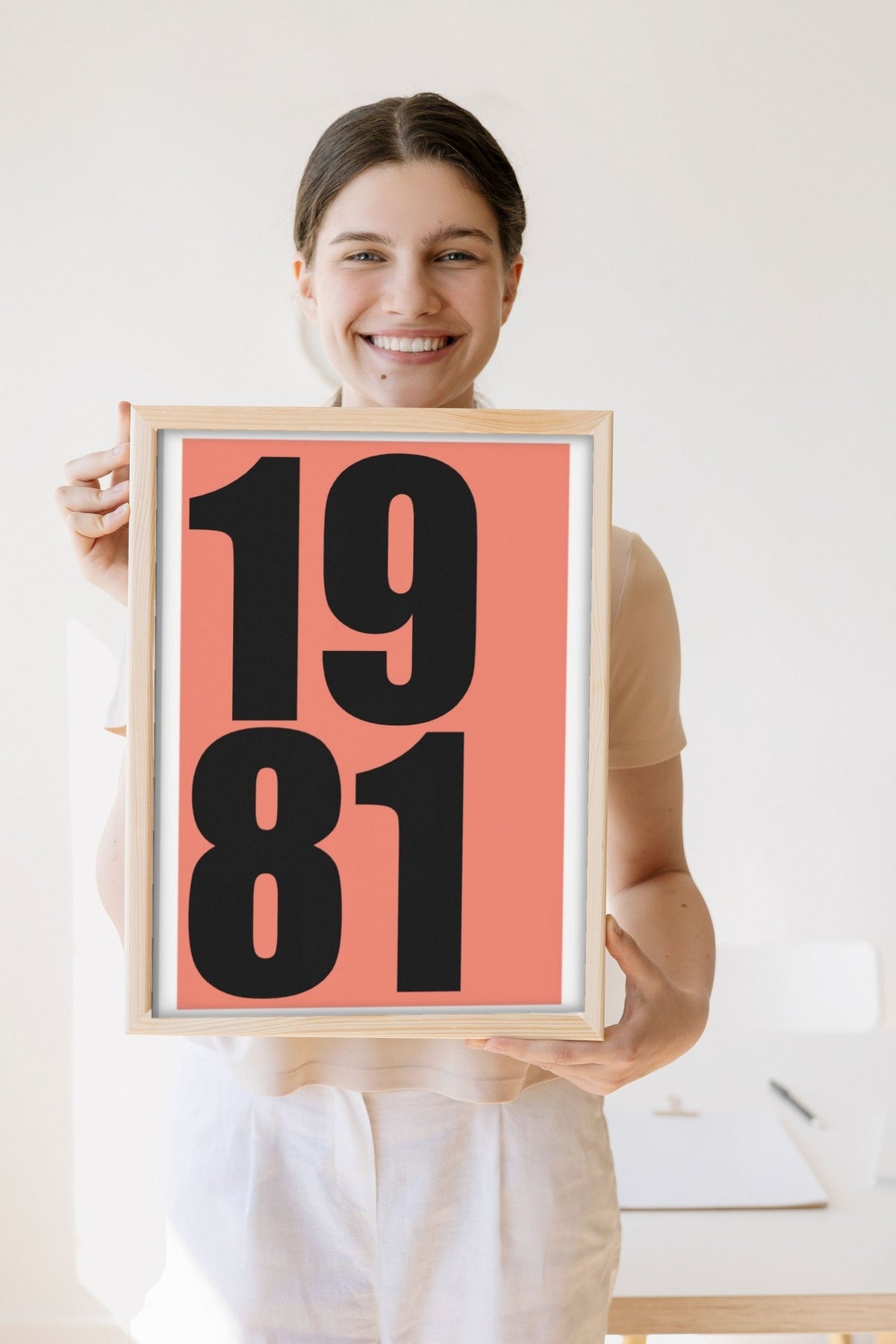 Lifestyle - Personalised Date Print held by a smiling woman