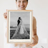 Lifestyle - Personalised Wedding Photo Print With Date held by a smiling woman