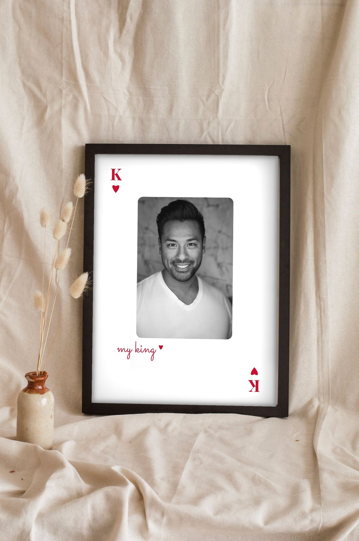 Lifestyle - Personalised Couples Playing Card Photo Print leaning in a frame with dried flowers