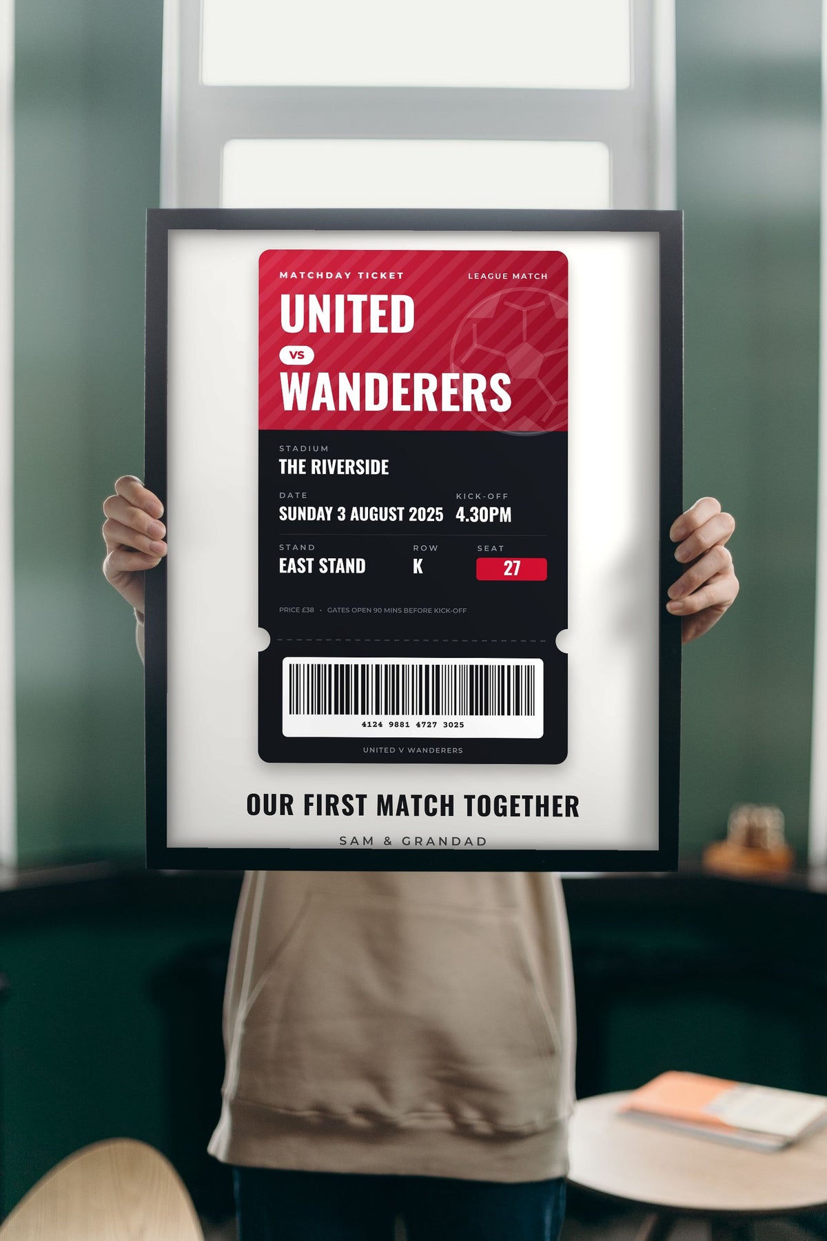 Lifestyle - Personalised Football Match Ticket Print held up in a bright room