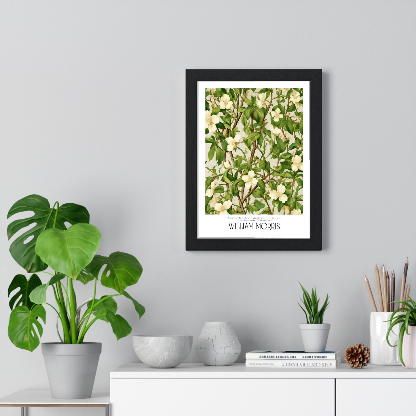11x14-14 framed poster displayed on living room wall above furniture