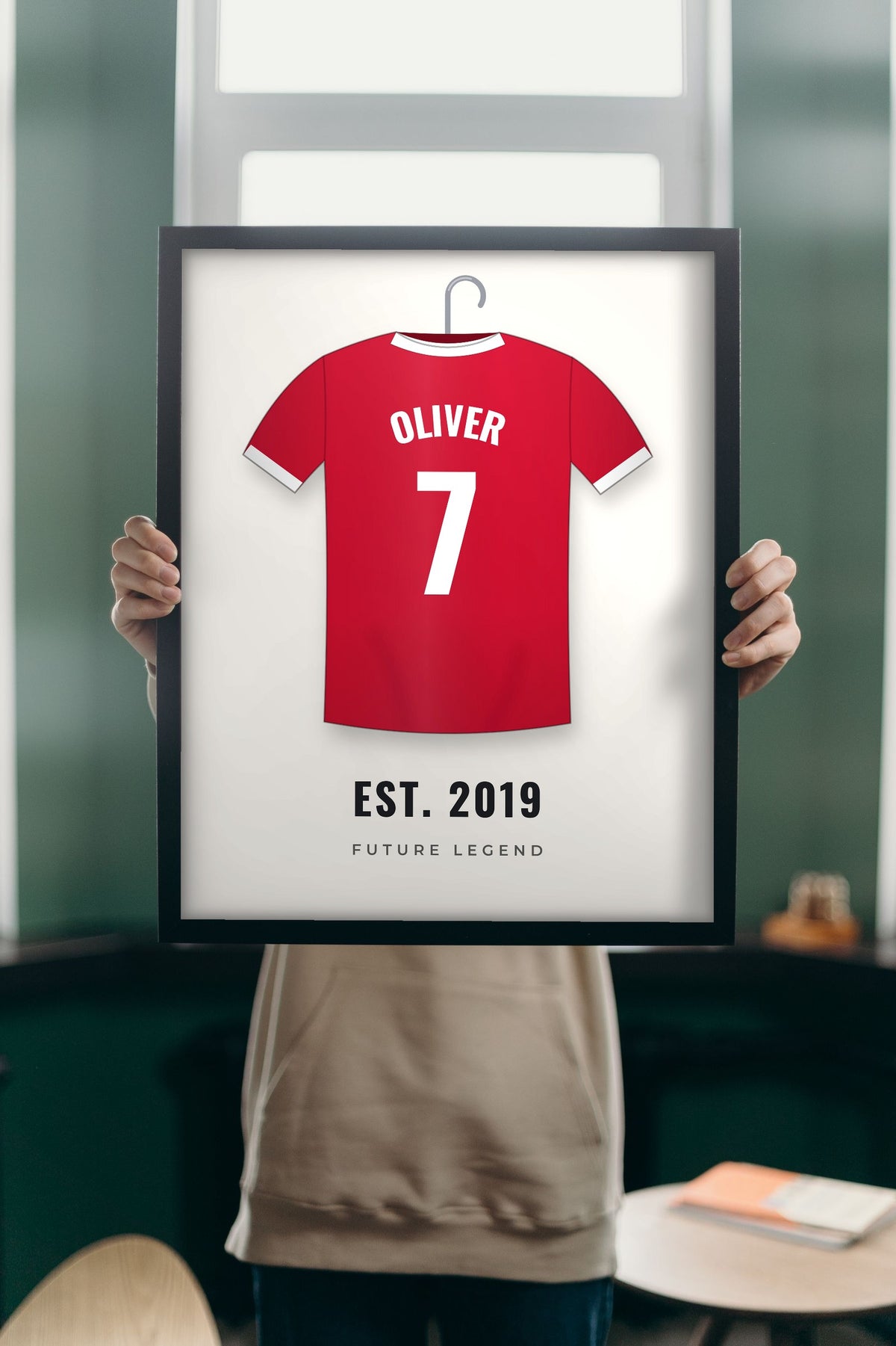 Lifestyle - Personalised Kids Football Shirt Print held up in a bright room