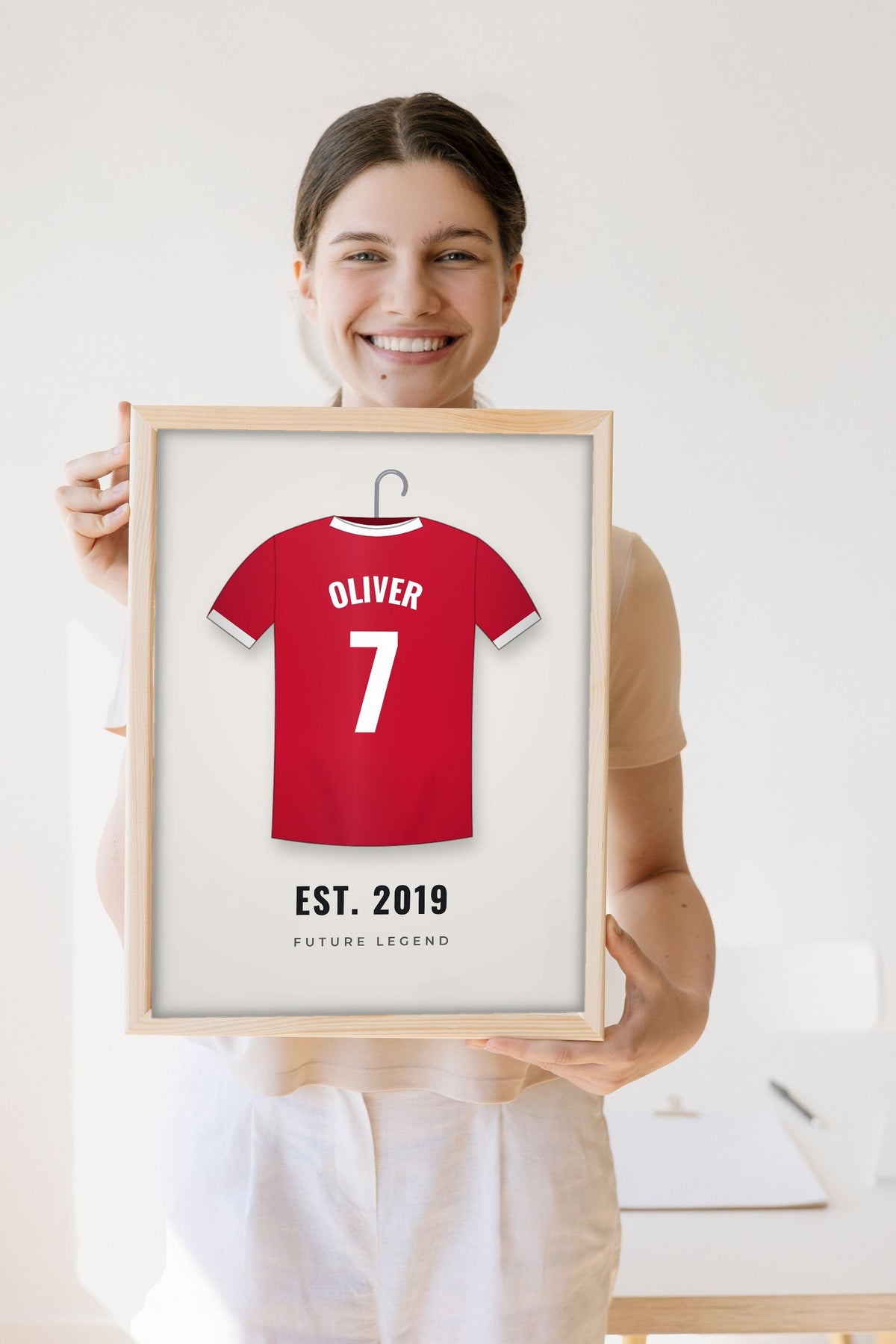 Lifestyle - Personalised Kids Football Shirt Print held by a smiling woman