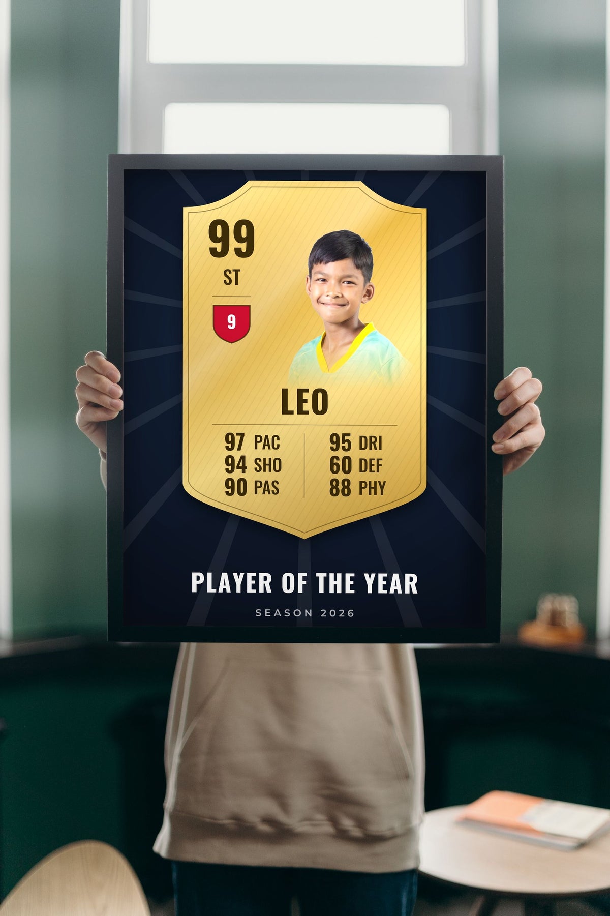 Lifestyle - Personalised Football Player Card Print held up in a bright room