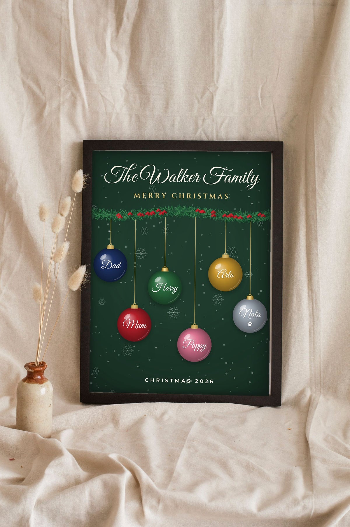 Lifestyle - Personalised Family Christmas Bauble Print leaning in a frame with dried flowers