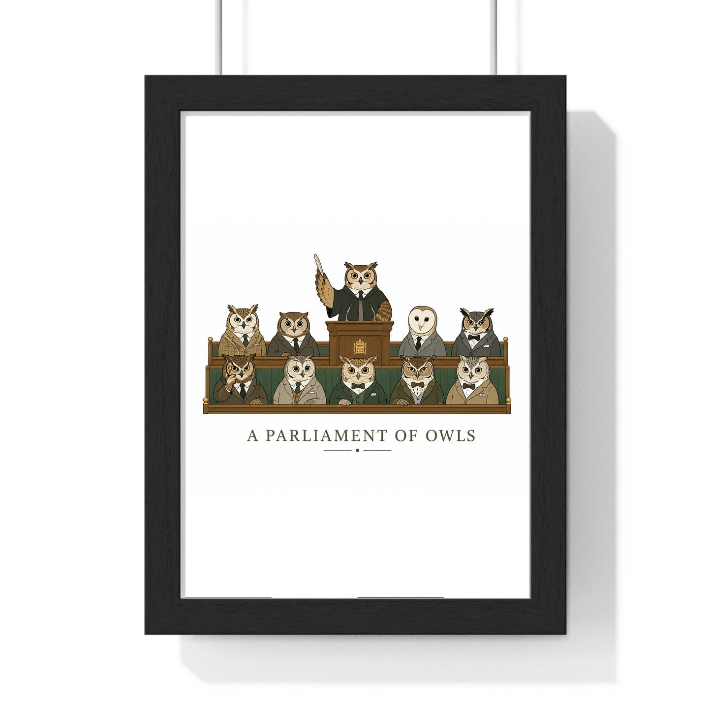 A Parliament of Owls poster in black wood frame