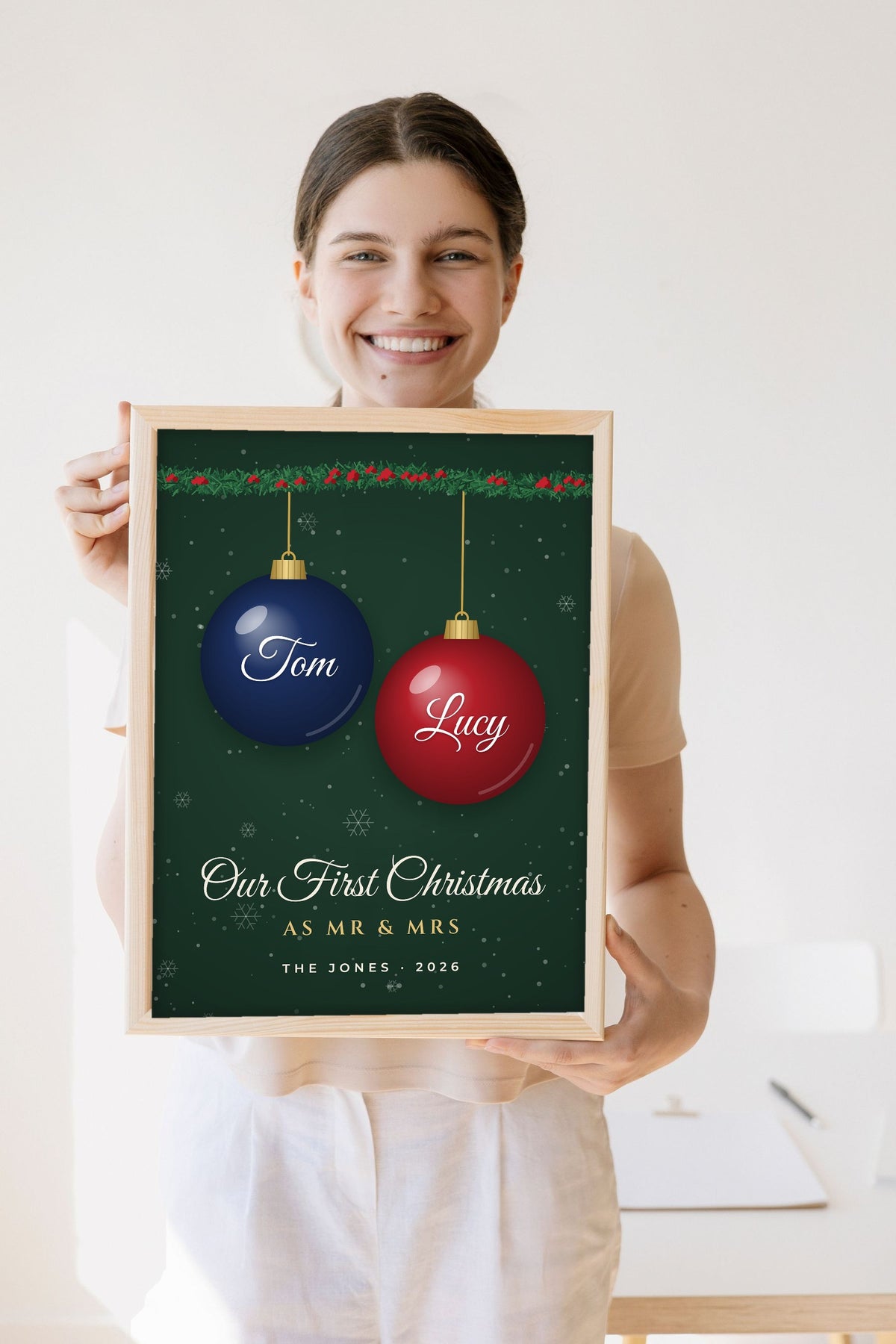 Lifestyle - Personalised First Christmas as Mr & Mrs Print held by a smiling woman