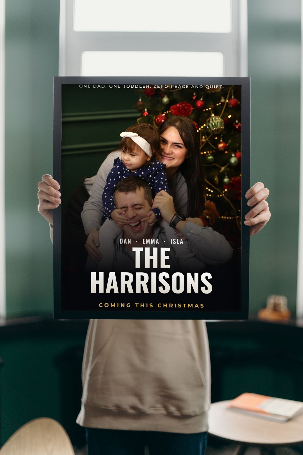 Lifestyle - Personalised Family Movie Poster held up in a bright room