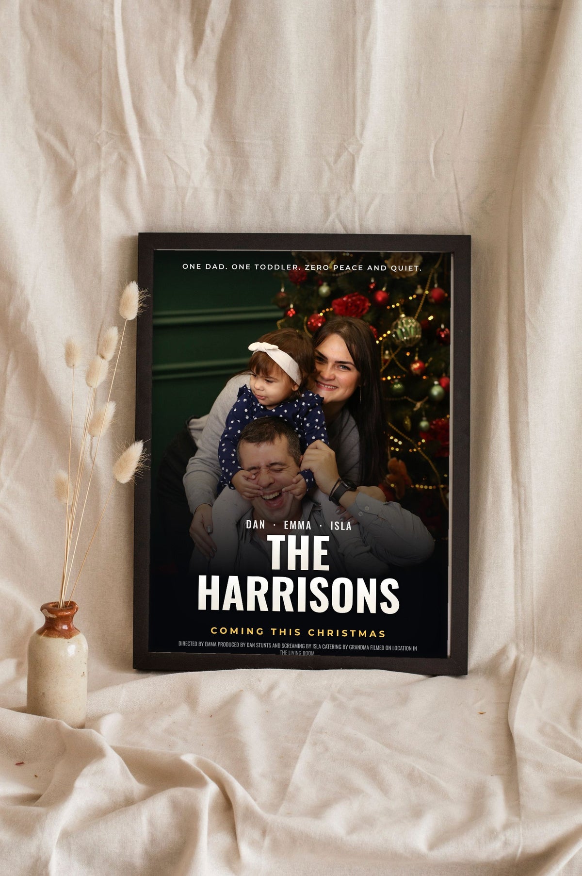 Lifestyle - Personalised Family Movie Poster leaning in a frame with dried flowers