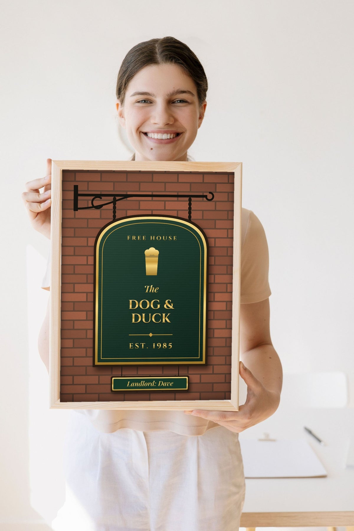 Lifestyle - Personalised Home Bar Pub Sign Print held by a smiling woman