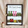 Lifestyle - Personalised Family Welly Boots Print leaning in a frame with dried flowers