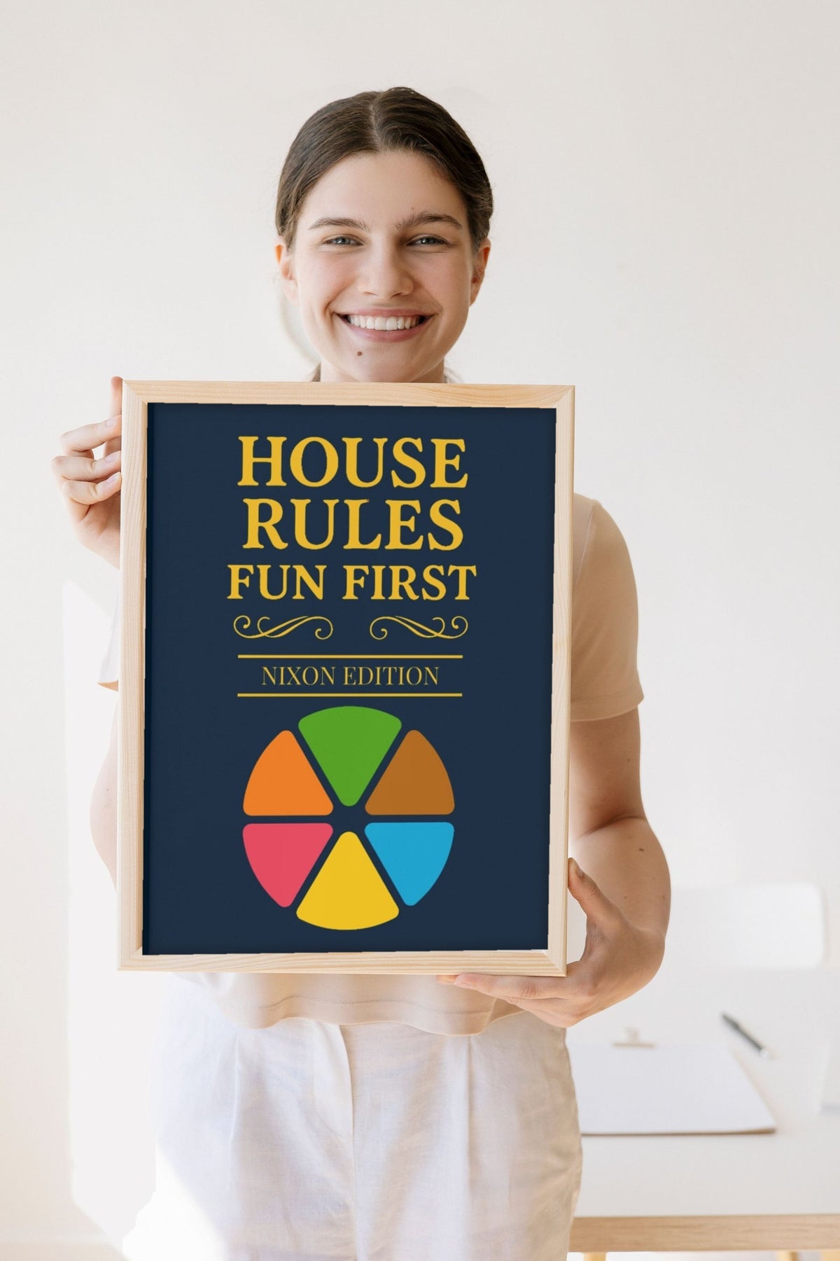 Lifestyle - Personalised Family Trivia Print held by a smiling woman