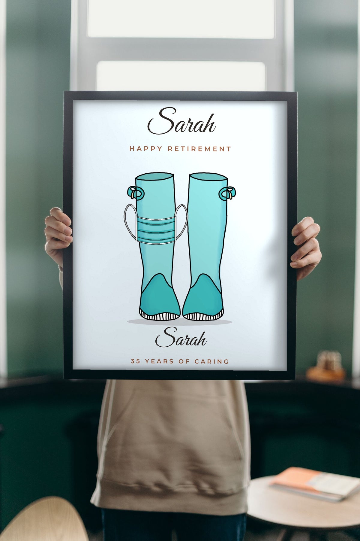 Lifestyle - Personalised Occupation Welly Boots Print held up in a bright room