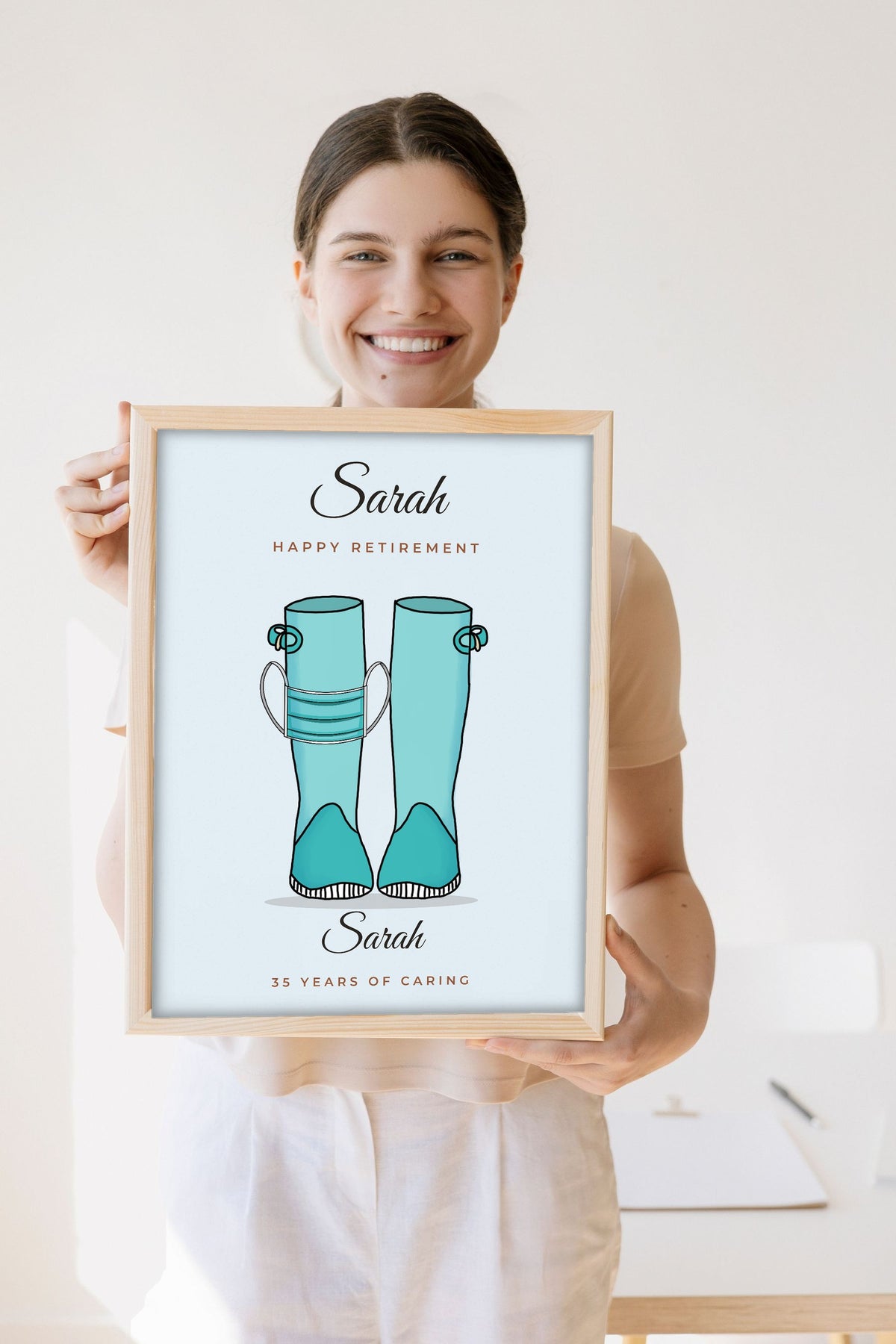 Lifestyle - Personalised Occupation Welly Boots Print held by a smiling woman