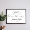 Lifestyle - Personalised Hands Heart Print hanging on a living room wall