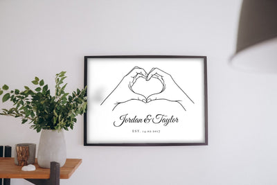 Lifestyle - Personalised Hands Heart Print hanging on a living room wall