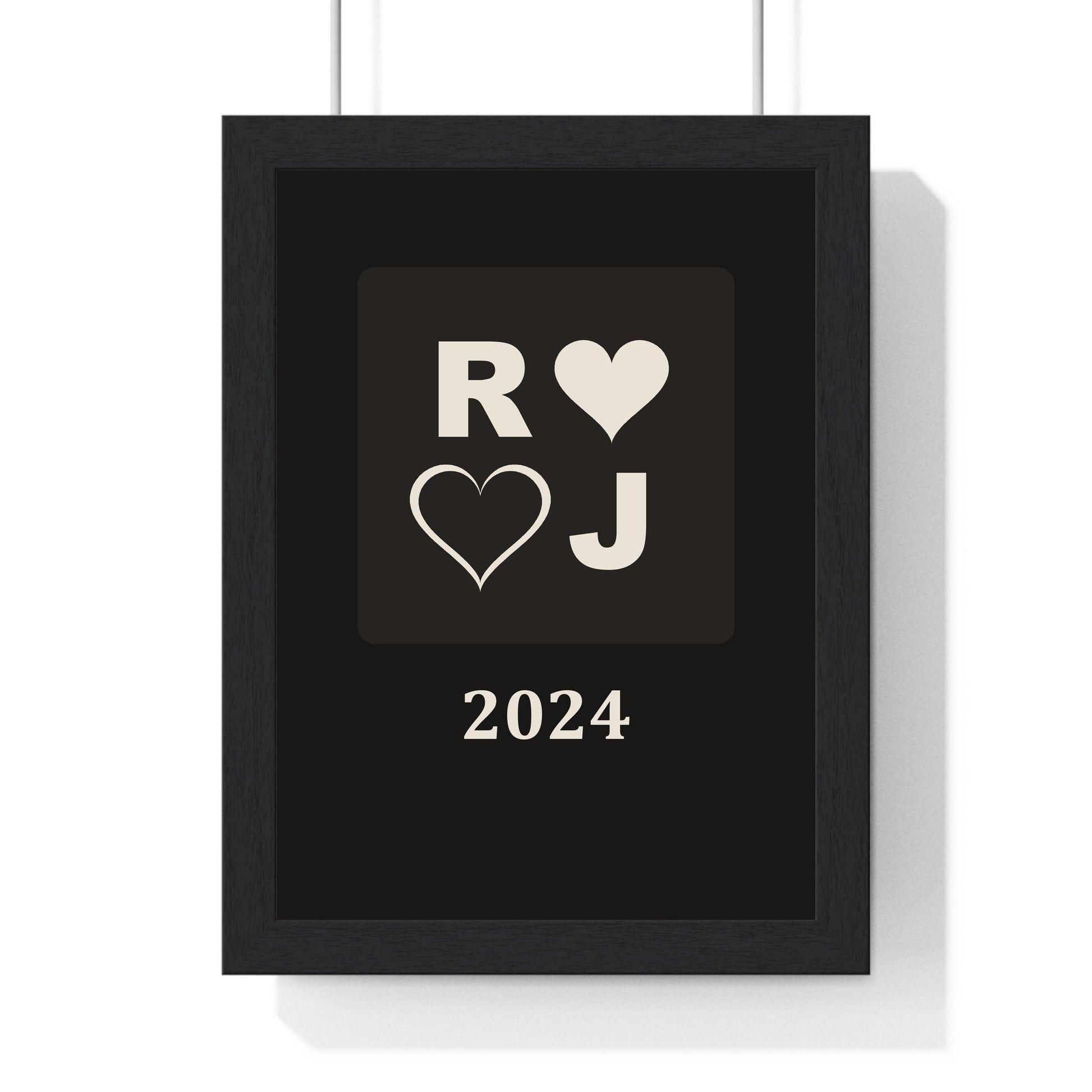 Minimalist couples initials print framed in black and cream