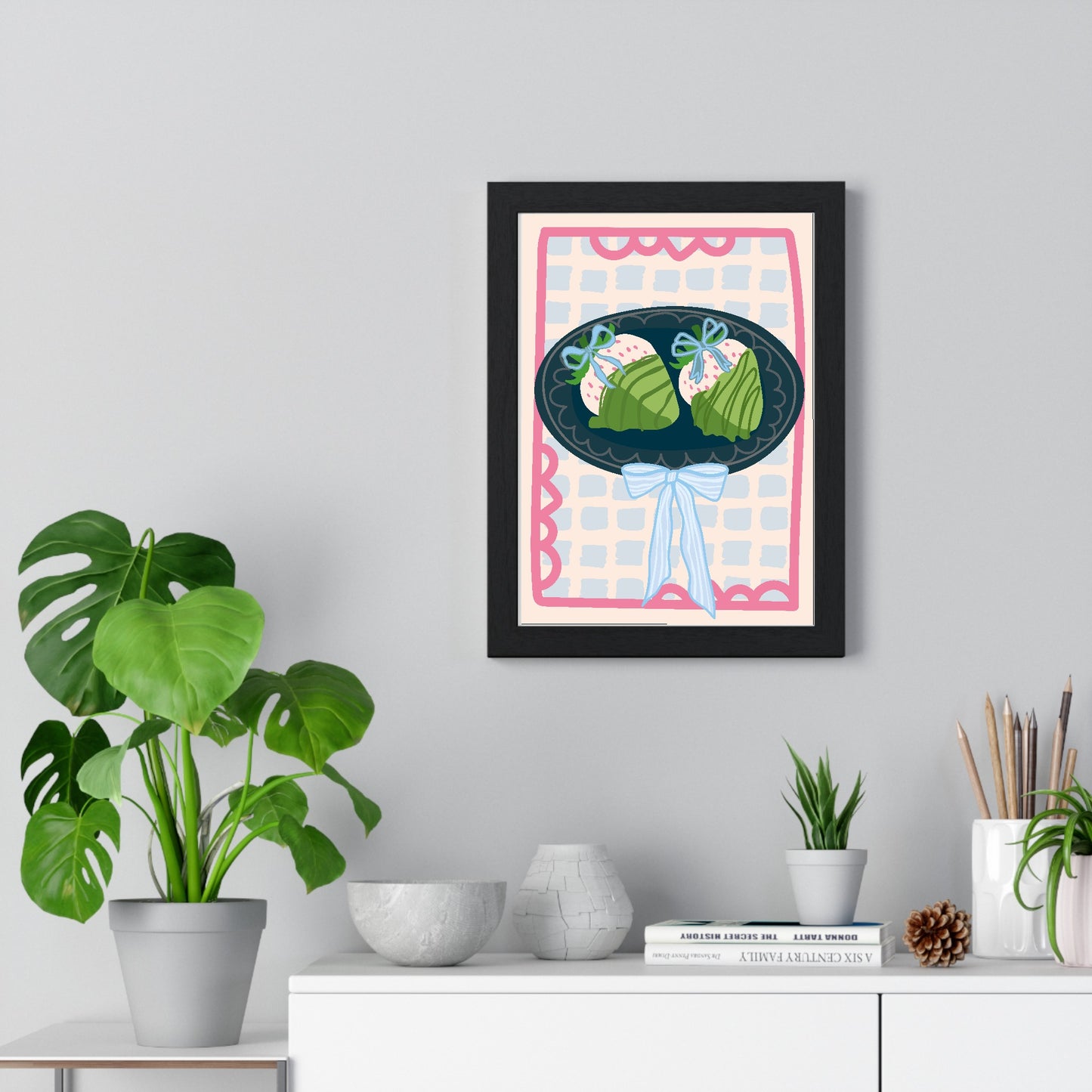 Strawberry matcha ice cream poster framed on living room wall above furniture