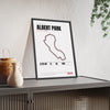 Albert Park Circuit print White framed and leaning on a sideboard