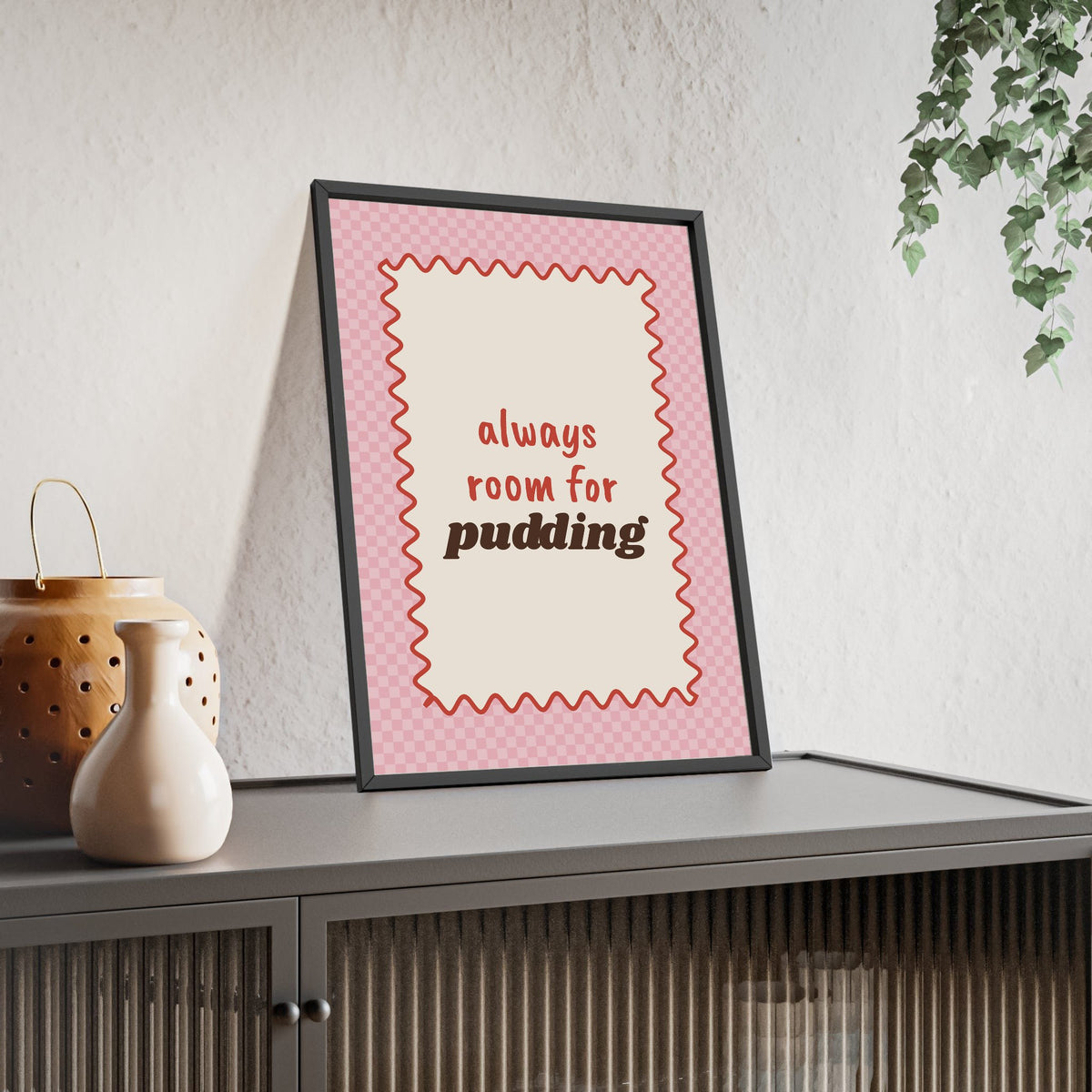 Always Room for Pudding Print framed and leaning on a sideboard