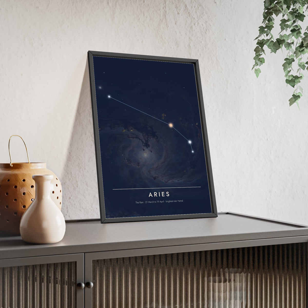 Aries Constellation print framed and leaning on a sideboard
