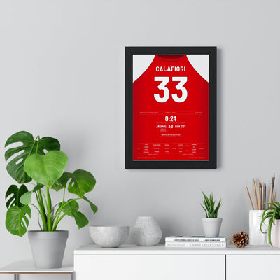 Arsenal Calafiori 33 Poster - 3-0 v Man City 2026 framed on a living room wall