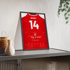 Arsenal Henry Goal v Spurs 2002 Poster - Henry 14 Knee Slide framed and leaning on a sideboard