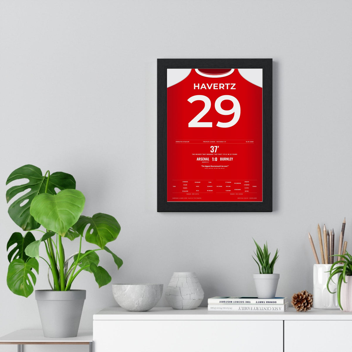 Arsenal Premier League Champions 2026 Poster - Havertz 29 v Burnley framed on a living room wall