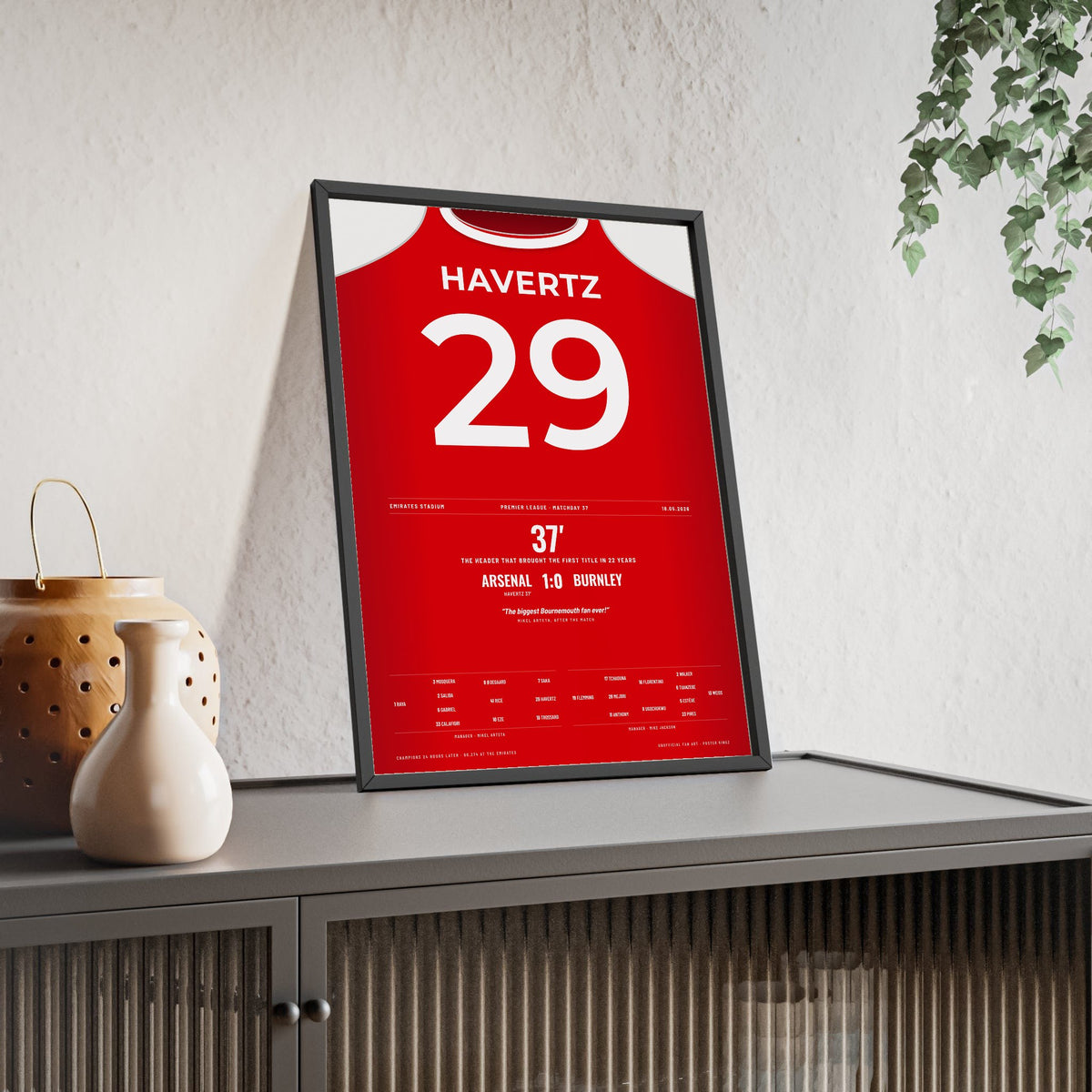 Arsenal Premier League Champions 2026 Poster - Havertz 29 v Burnley framed and leaning on a sideboard