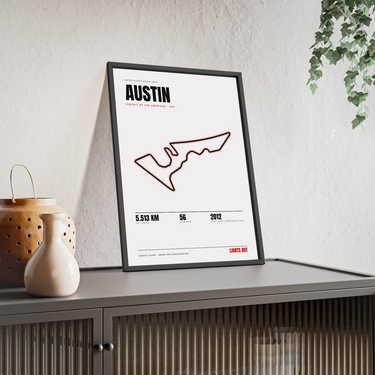 Austin Circuit print White framed and leaning on a sideboard