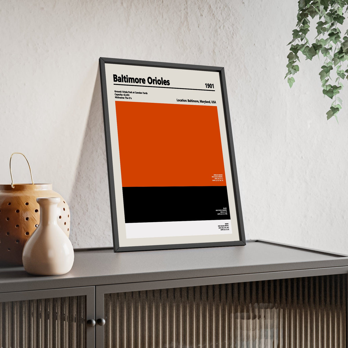 Baltimore Orioles colour swatch print framed and leaning on a sideboard