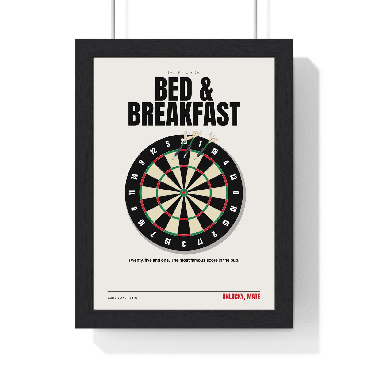 Bed and Breakfast 26 Darts print framed in a black frame, ready to hang