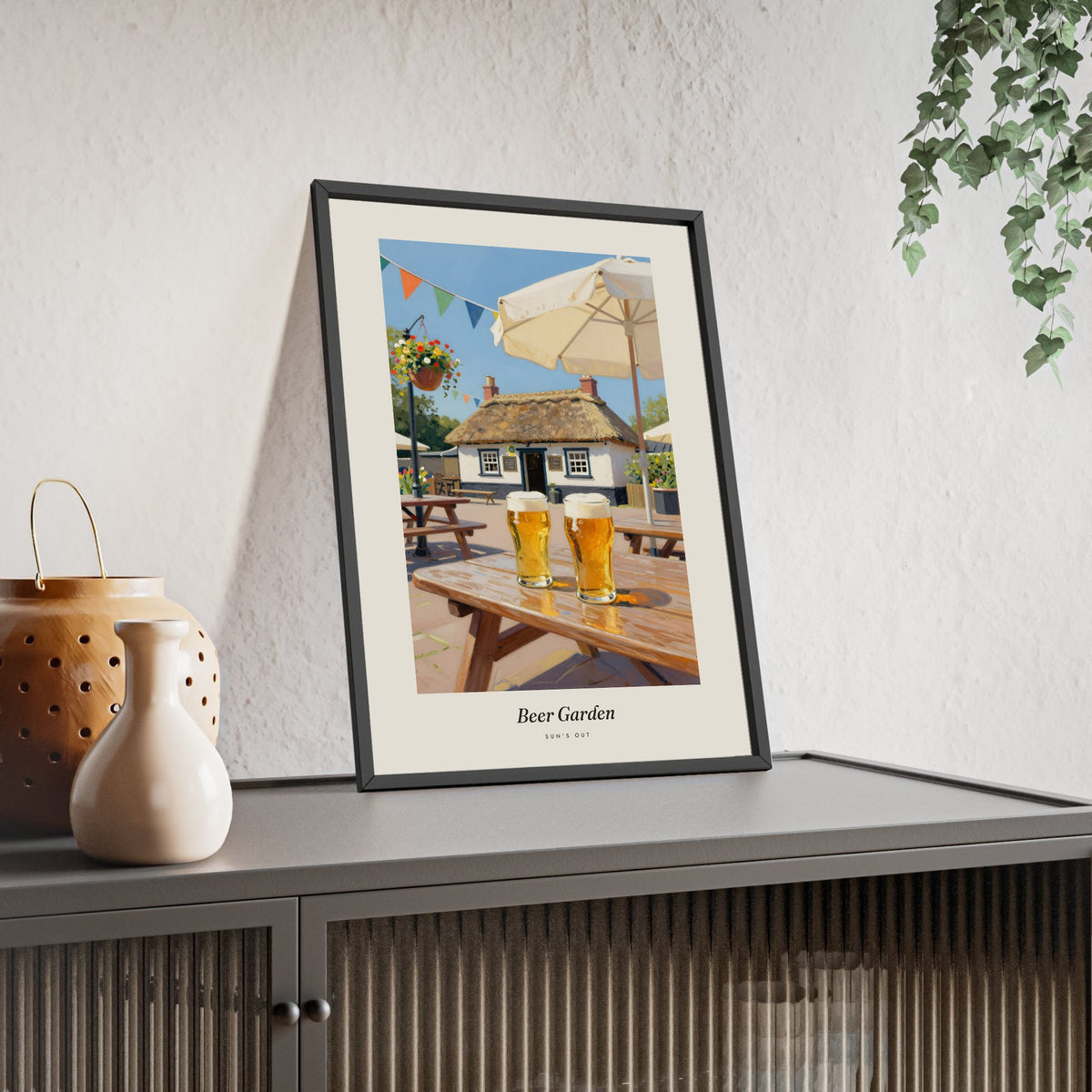 Beer Garden Painting Print framed and leaning on a sideboard