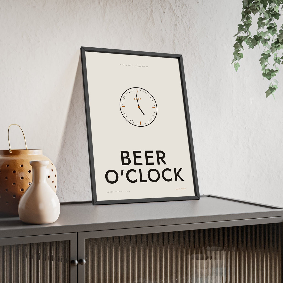 Beer O'Clock Print framed and leaning on a sideboard