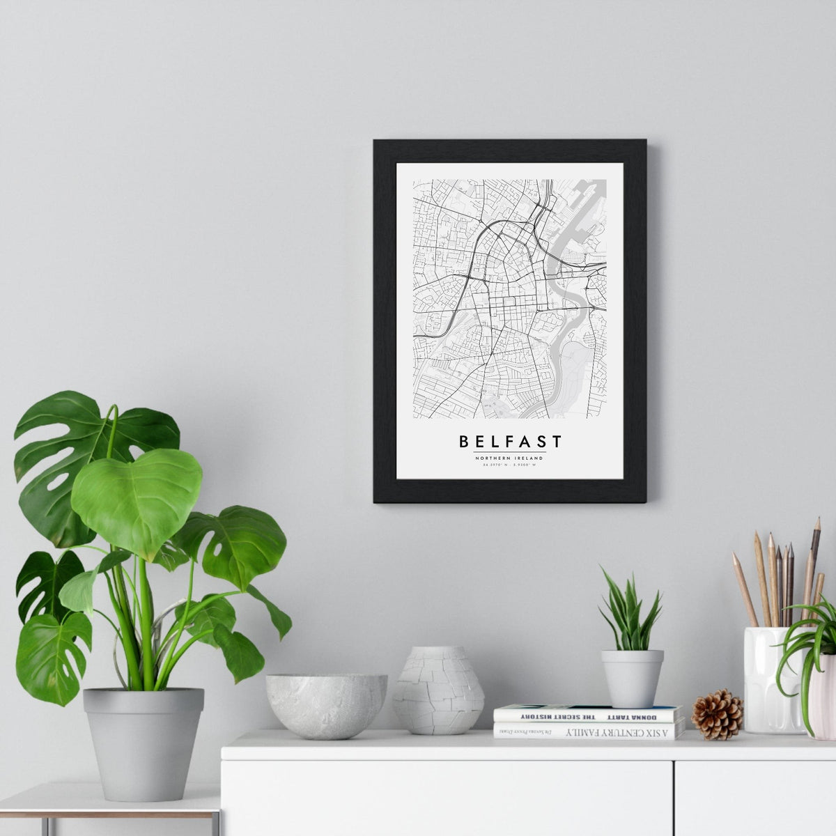 Belfast street map poster in white, minimal city map print framed on a living room wall