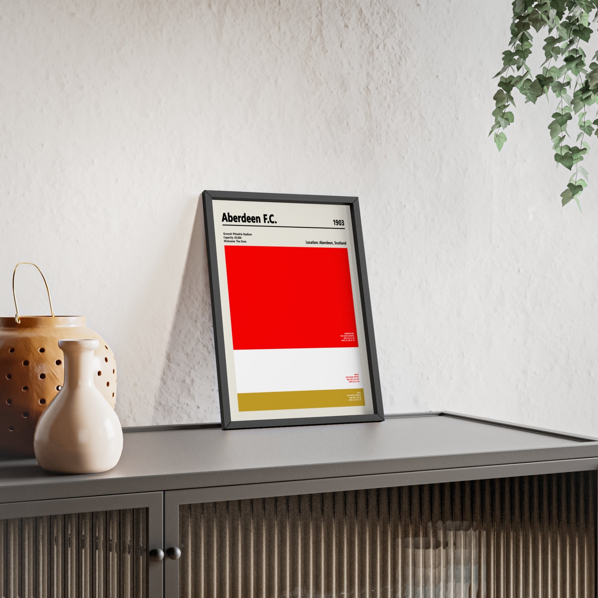 Minimalist Aberdeen football wall art framed in modern interior