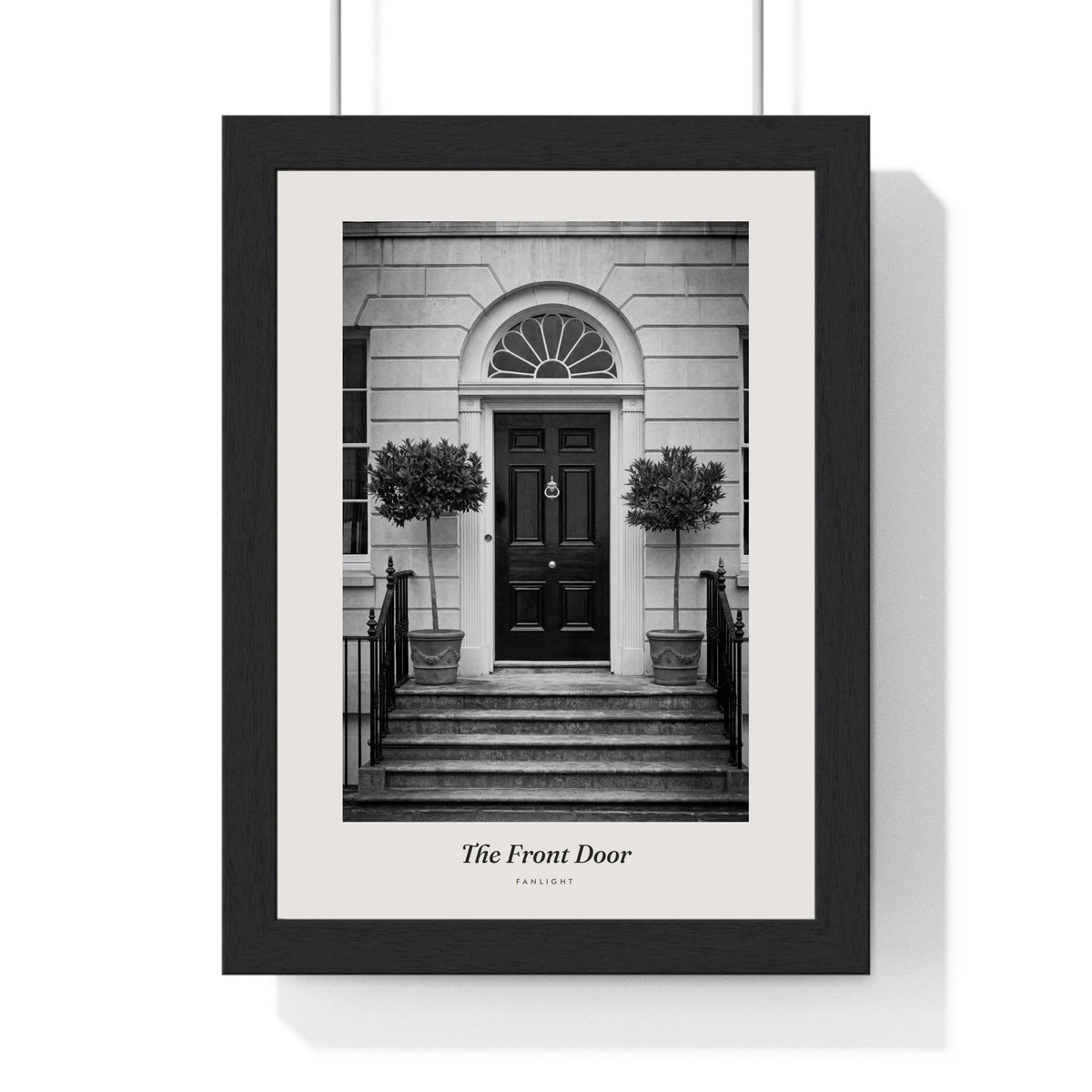 The Front Door Print framed in a black frame, ready to hang