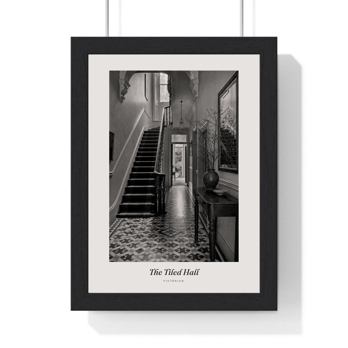 The Tiled Hall Print framed in a black frame, ready to hang