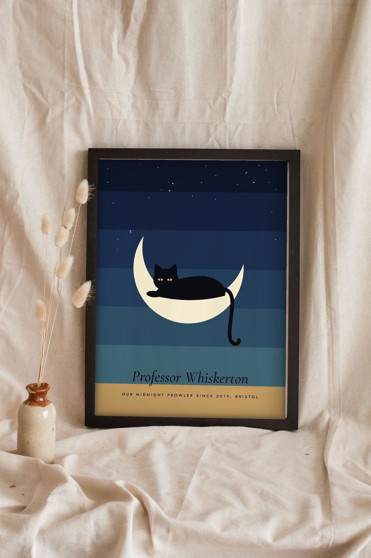 Black Cat Moon Print - midnight blue cat moon print leaning on a shelf