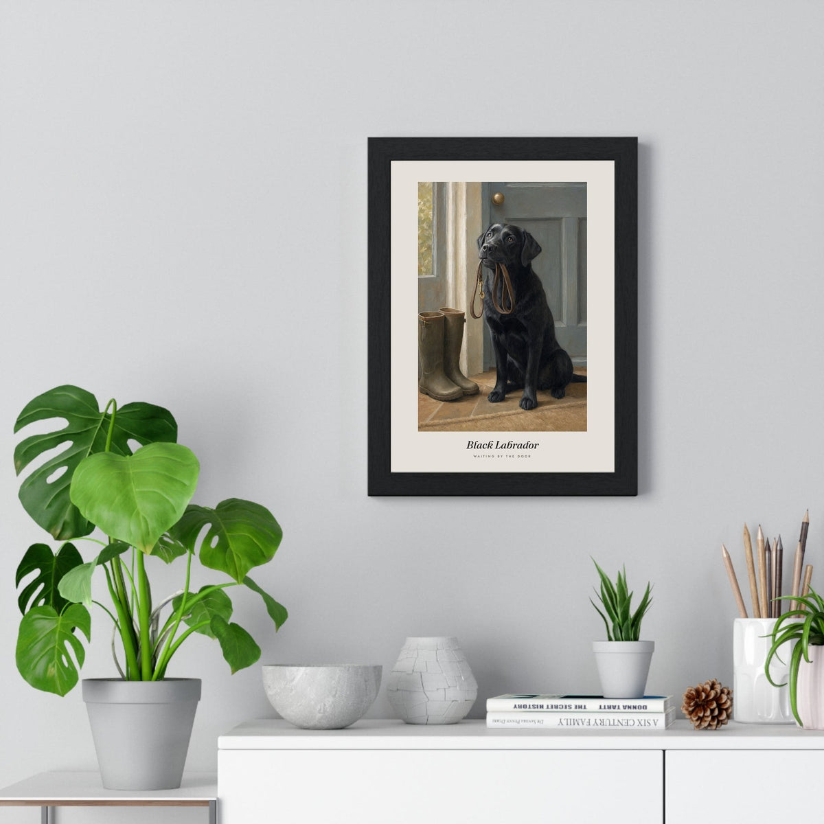Black Labrador Print framed on a living room wall