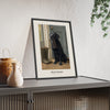 Black Labrador Print framed and leaning on a sideboard