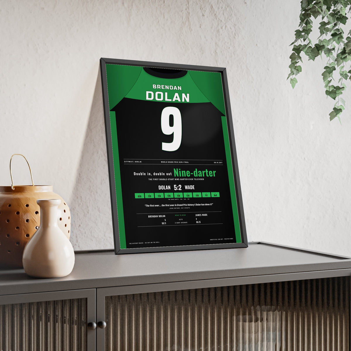 Brendan Dolan World Grand Prix 2011 Darts Poster - Double-Start Nine-Darter Shirt Print framed and leaning on a sideboard