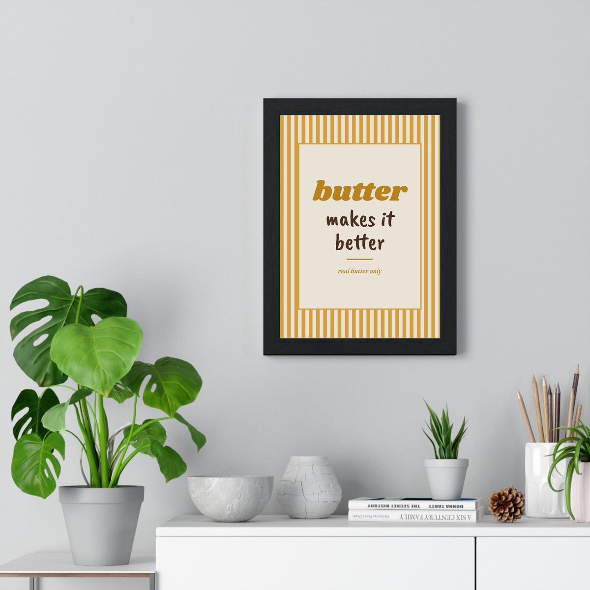Butter Makes It Better Print framed on a living room wall
